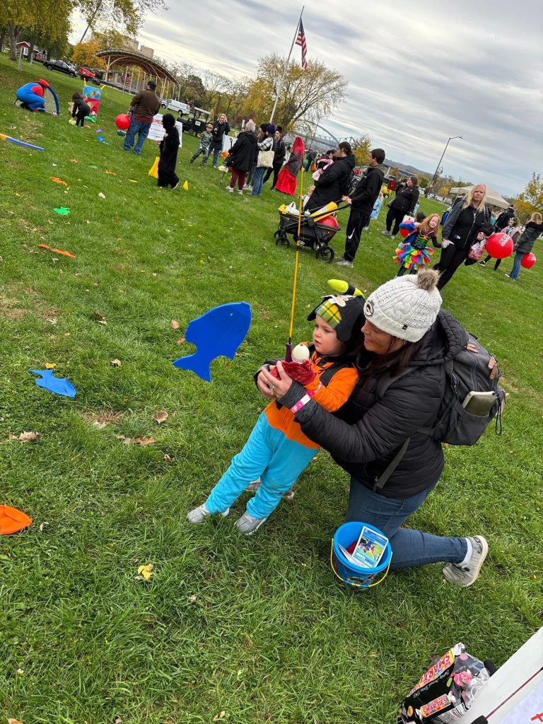 A family enjoying the event in the park