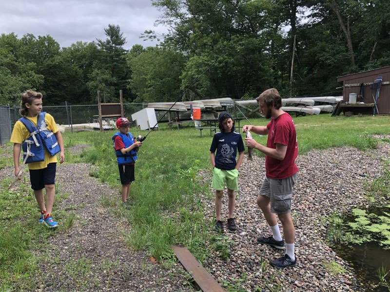 Campers hiking on a trail